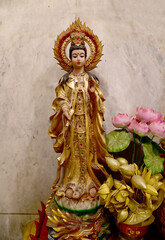 BANGKOK, THAILAND - MAY 16, 2024: Golden Buddha statues in Buddhist temples for those who have faith to come to pay respect and worship in temples in Thailand.