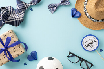 A thoughtful display of Father's Day gifts featuring a hat, ties, a soccer ball, glasses, and a...