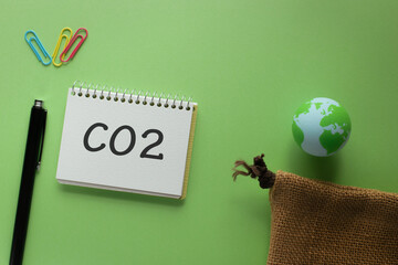 There is notebook with the word CO2. It is as an eye-catching image.