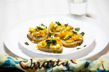 Healthy breakfast, toast with avocado, eggs and tomatoes