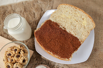 Bread with choco and butter on a plate for breakfast	