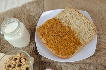 Bread with chicken floss on a plate for breakfast. Homemade bread with dried shredded chicken