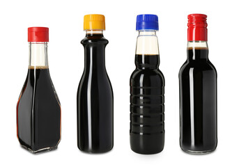 Soy sauce in bottles isolated on white, set