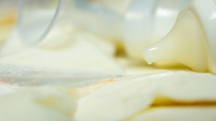 Breast milk storage bags, Bottles and Frozen breast milk for new baby,  Breast Pumping milk concept. selective focus.