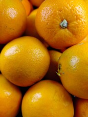 Lemon fruit. Stacked citrus fruits are sold at supermarkets. Sweet fruits are fresh and healthy.