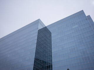 glass office buildings and cloudy sky