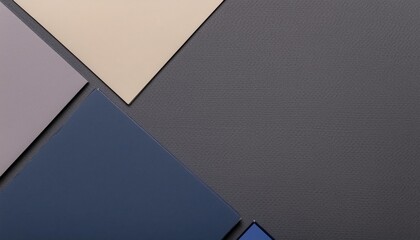 グレー、ベージュ、紺色などのカラーペーパーで組み合わせた幾何学構成の背景