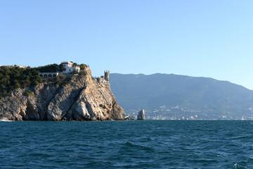 Fototapeta premium Castle Swallow's Nest on a rock at Black Sea, Crimea. It is a symbol and tourist attraction of Crimea