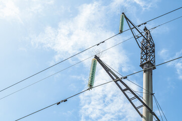 Glass insulators on high voltage power lines.