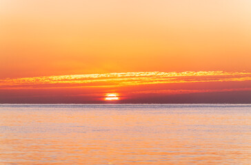 Beautiful red and orange sunrise over the sea.