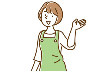 エプロン姿で案内する若い女性