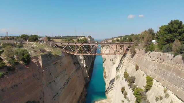 Bridge Near Collapsed Part Of Limestone Wall At Corinth Canal In Greece. drone pullback shot