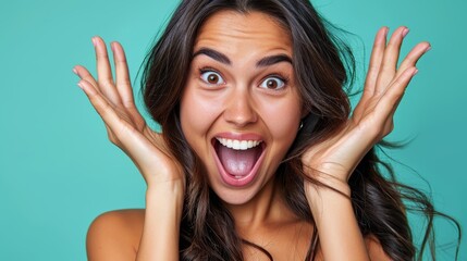  A woman making a humorous expression, her hands held in front of her face, eyes wide with surprise