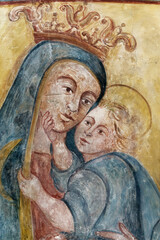 A mural fresco of Madonna with the child. Fresque murale de la Vierge Marie et l'enfant J&eacute;sus. Italie