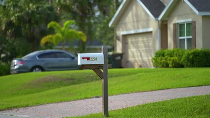 American mailbox at Florida home front yard on suburban street side