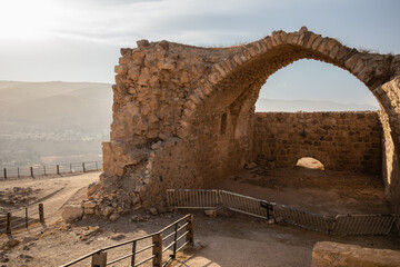 Ruin of Arch of Historical Landmark in Jordan. Medieval Kerak Castle with Landscape in the Middle...