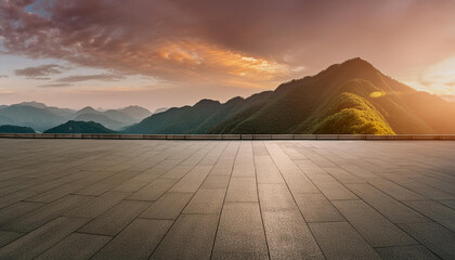 Fototapeta premium blank space concrete floor foreground with sunset and mountains background montage for advertising