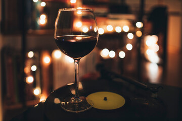 Glass of red wine swirling on the turntable