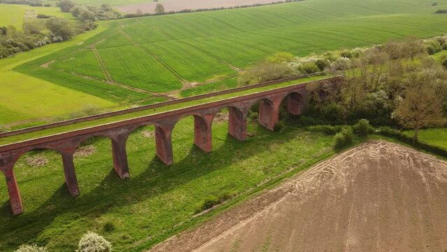 An aerial view of the Ledbury Viaduct bridge in England during daylight