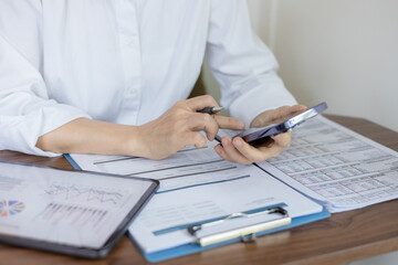 Woman is checking credit card bill information