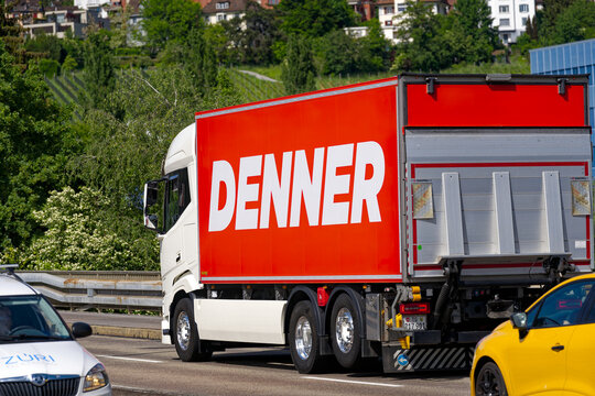 Truck of retail company Denner crossing Europe Bridge at Swiss City of Z&uuml;rich on a sunny spring afternoon. Photo taken May 14th, 2024, Zurich, Switzerland.