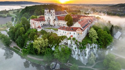 Opactwo Benedyktynów w Tyńcu o wschodzie słońca z mgłą - widok z drona © Michal45