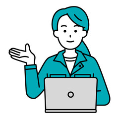 右手で紹介するノートパソコンで仕事をしている作業着の女性