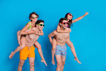 Photo of funky excited buddies company dressed bikini holding hands arms having fun empty space...