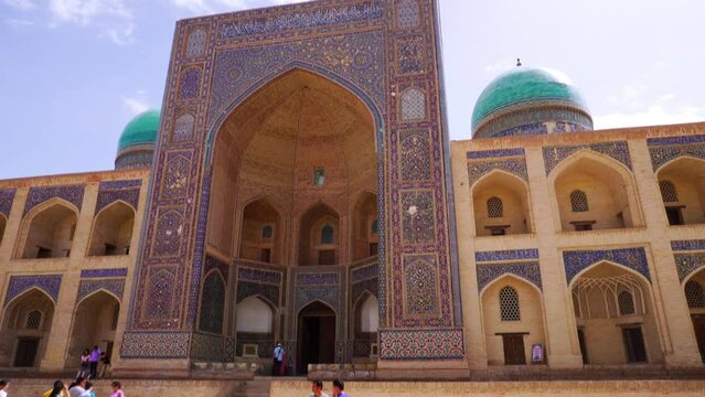 View of Kalan Minaret Emir and Alim Khan madrasah of Po-i-Kalan (Poi Kalan) -Translation: "Poi Kalan islamic religious complex" Bukhara, Uzbekistan