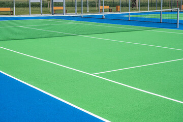 Part of the synthetic grass tennis court with markup