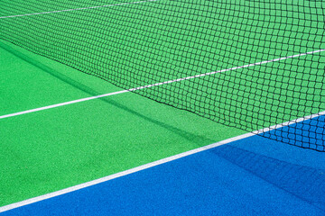 Part of the synthetic grass tennis court with markup