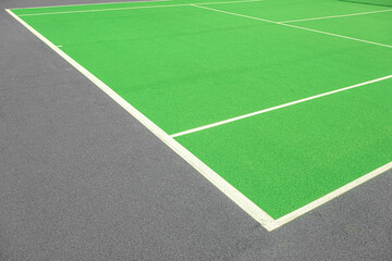 Part of the synthetic grass tennis court with markup