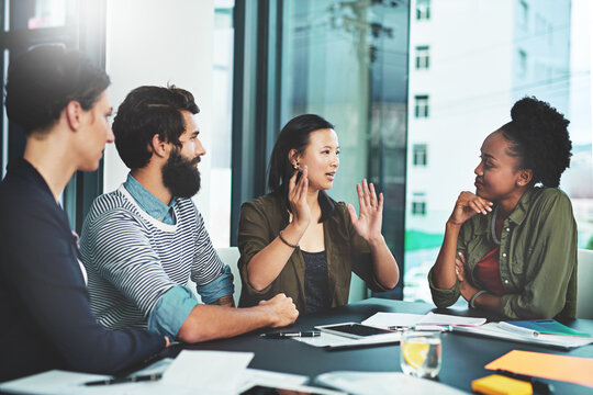 Business people, meeting and teamwork with paperwork for training seminar and brainstorming in office. Corporate group, communication and brainstorming with documents for intern feedback and support