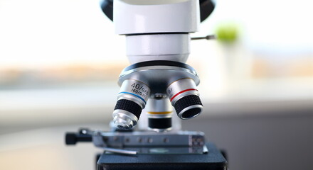 Head microscope on the background laboratory is a study human biology analyzes for non-compliance...