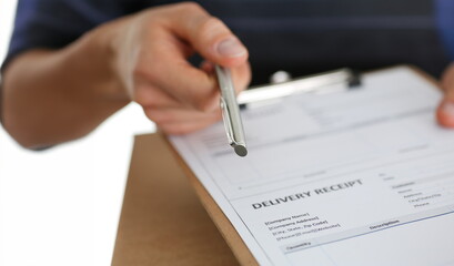 Specialist courier delivery service offers to fill the contract of cooperation to the client. Terms of delivery are agreed upon and signed by both parties with a pen in hand