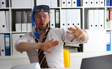 Man wearing suit and tie in goggles and snorkel articulate at workplace in office portrait. Count days to leave annual day off workaholic more task job tourism resort idea ticket sale concept