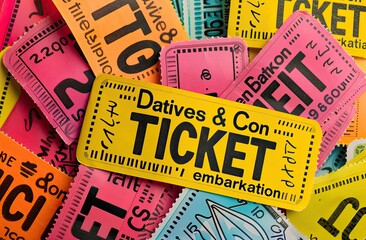 Multiple color paper show tickets in pile