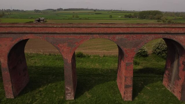 An aerial view of the Ledbury Viaduct bridge in England during daylight