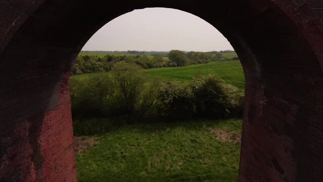 An aerial view of the Ledbury Viaduct bridge in England during daylight
