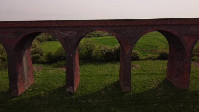 An aerial view of the Ledbury Viaduct bridge in England during daylight