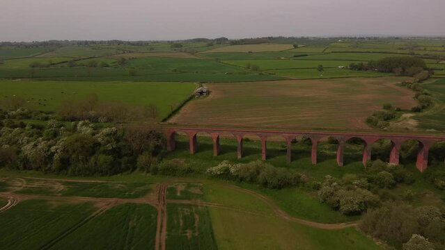 An aerial view of the Ledbury Viaduct bridge in England during daylight