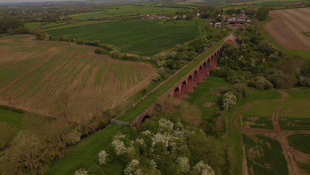 An aerial view of the Ledbury Viaduct bridge in England during daylight