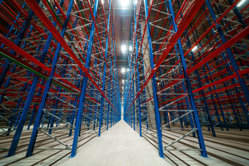 A male architect in an empty commercial warehouse