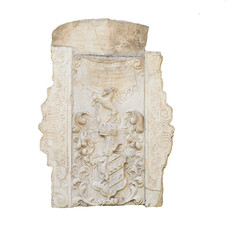 the old tombstones and reliefs on the wall