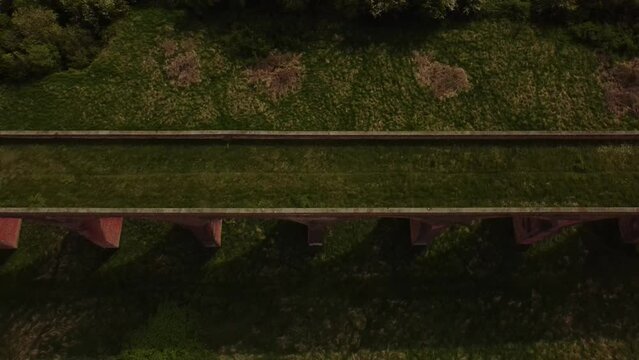 An aerial view of the Ledbury Viaduct bridge in England during daylight