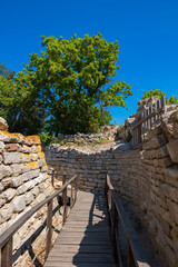 Ruins of Troy and wooden walkway. Visit Turkey concept photo.