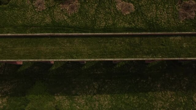 An aerial view of the Ledbury Viaduct bridge in England during daylight