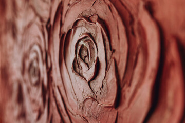 Red wall of molded roses, background