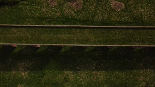 An aerial view of the Ledbury Viaduct bridge in England during daylight