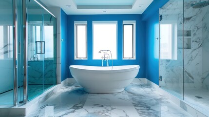 The bathtub is placed in a luxurious bathroom decorated with marble and has a modern design with blue walls.